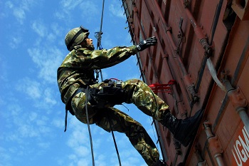 090428-N-3970R-002
SOUDA BAY, Greece (April 28, 2009) An Italian Marine participates in a cargo container inspection exercise during exercise Phoenix Express 2009. Phoenix Express is part of the overall U.S. Africa Command and U.S. Naval Forces Europe, U.S. Naval Forces Africa, U.S. 6th Fleet Theatre Security Cooperation strategy to enhance regional stability in the region through increased interoperability and cooperation among regional allies from the United States, Africa, and Europe. (U.S. Navy photo by Mass Communication Specialist 1st Class Jenniffer Rivera/Released)